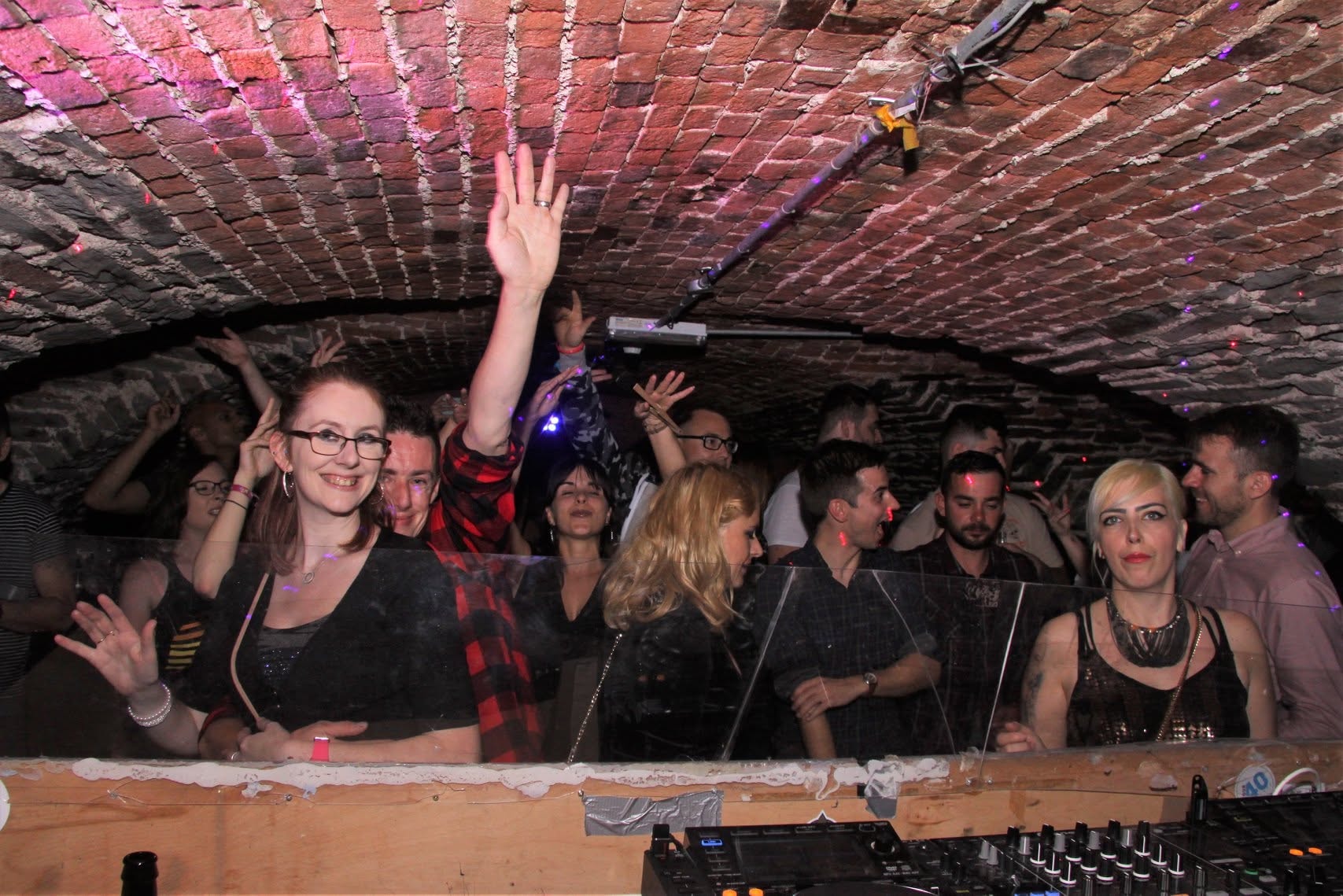DJ booth and crowd waving at Trancelation