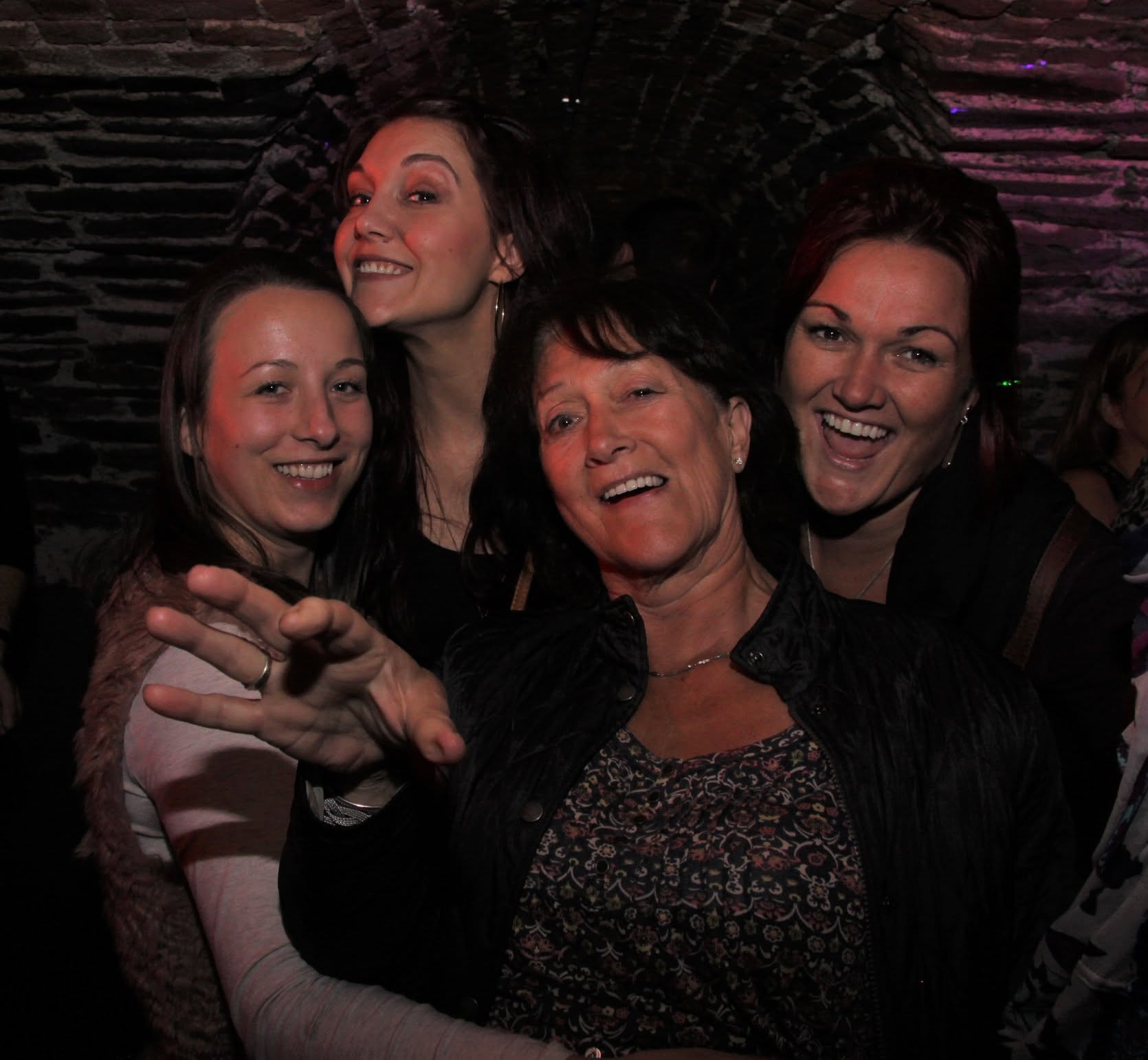 Four women laughing together at a Trancelation night
