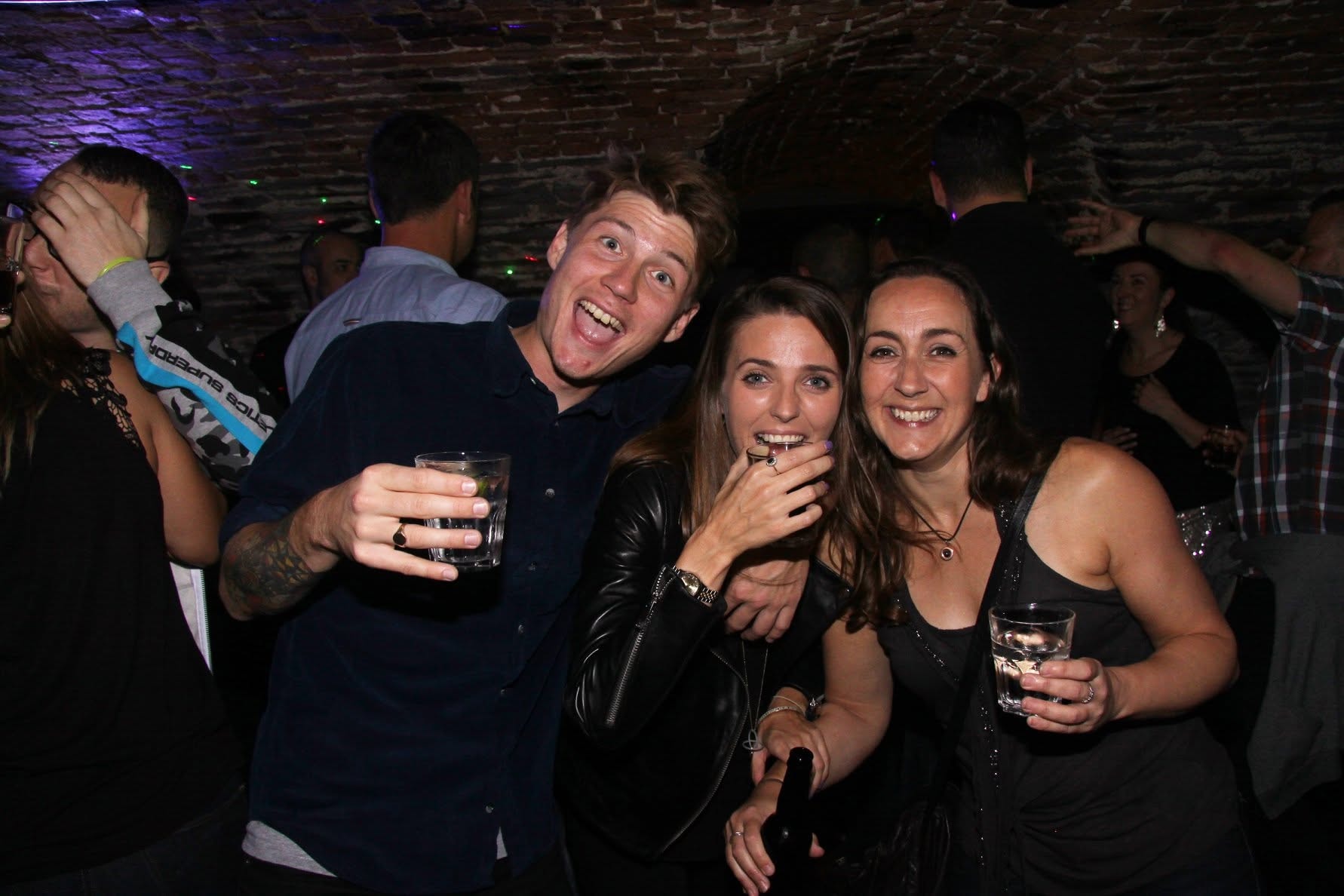 Three friends with drinks at Trancelation