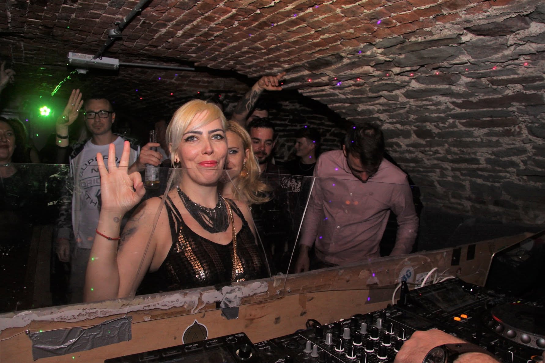 Female DJ behind the decks at Trancelation
