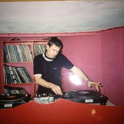 Two DJs on Pioneer decks at Trancelation, Desperados sign behind